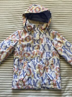 Roxy Kids Hooded Raincoat in Light Blue, Pink & Yellow Letter Print